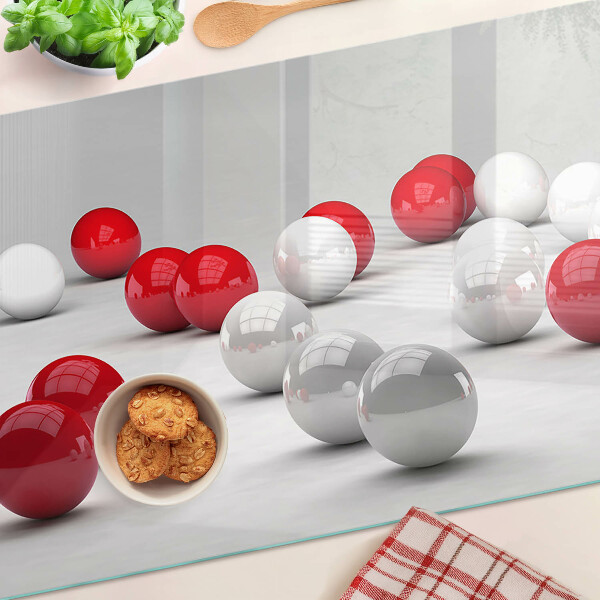 Tagliere in vetro temperato con motivo a sfere rosse e bianche