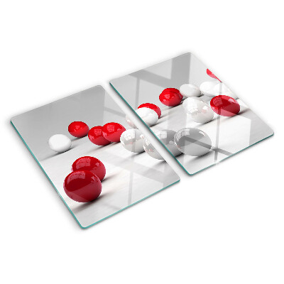 Tagliere in vetro temperato con motivo a sfere rosse e bianche