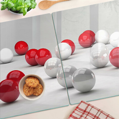 Tagliere in vetro temperato con motivo a sfere rosse e bianche