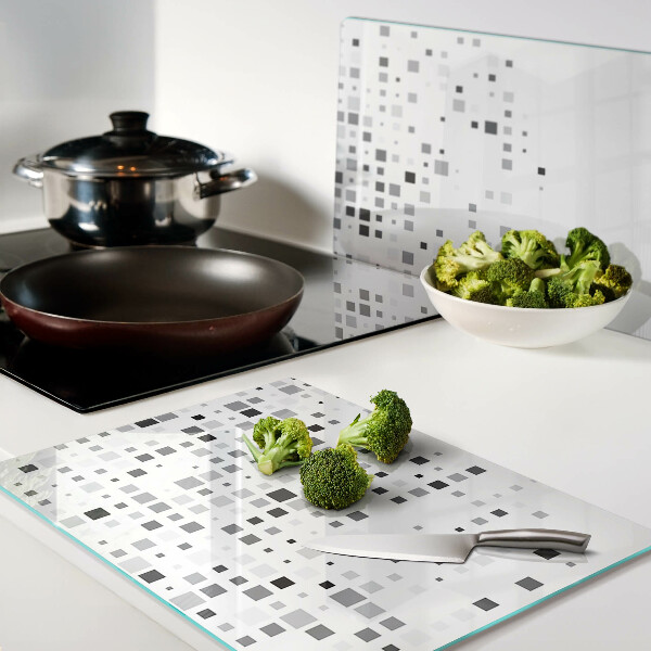 Tagliere in vetro temperato con motivi geometrici nei toni del grigio