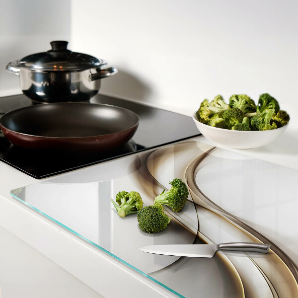 Tagliere in vetro temperato con motivo a onde nei toni del beige