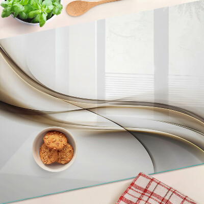 Tagliere in vetro temperato con motivo a onde nei toni del beige