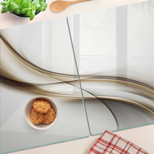 Tagliere in vetro temperato con motivo a onde nei toni del beige