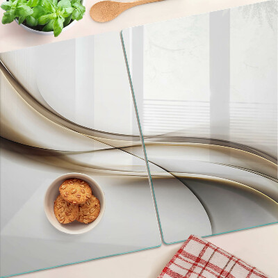 Tagliere in vetro temperato con motivo a onde nei toni del beige