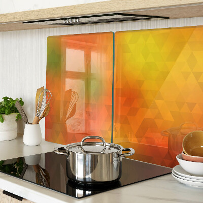 Tagliere in vetro con motivo geometrico nei toni dell'arancione