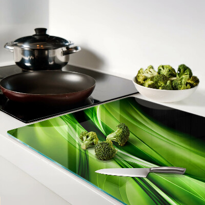 Tagliere in vetro temperato con motivo a onde verdi astratte