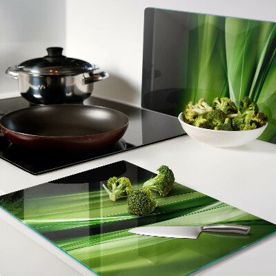 Tagliere in vetro temperato con motivo a onde verdi astratte