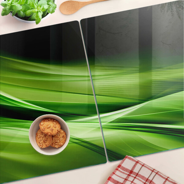 Tagliere in vetro temperato con motivo a onde verdi astratte