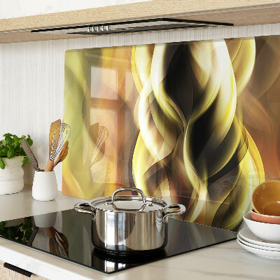 Tagliere in vetro con decorazione a onde astratte nei toni dell'oro