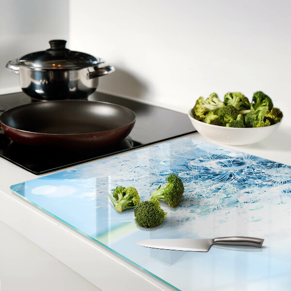 Tagliere in vetro temperato con motivo a fiore di dente di leone e gocce d'acqua