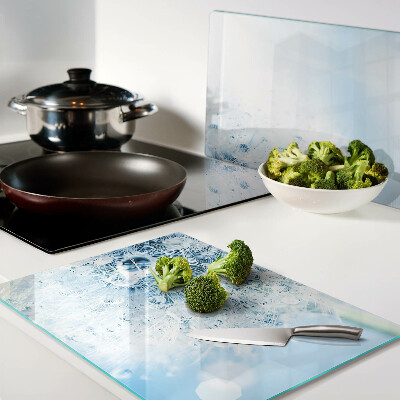 Tagliere in vetro temperato con motivo a fiore di dente di leone e gocce d'acqua