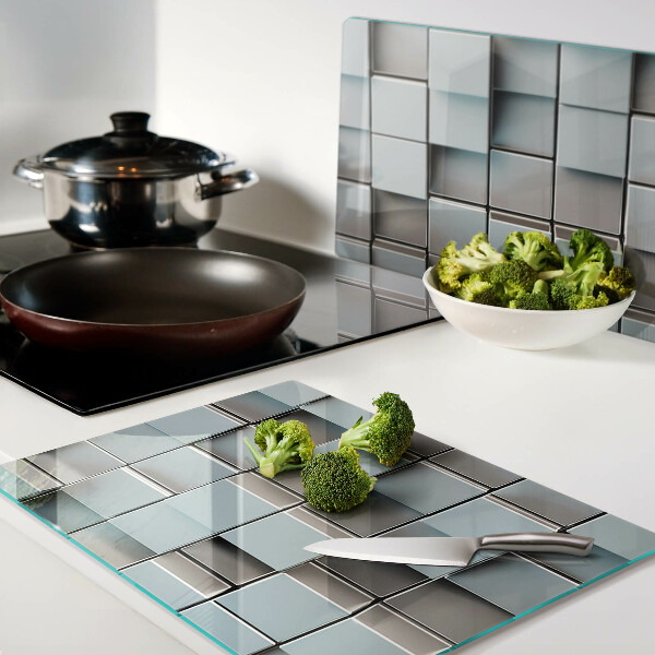 Tagliere in vetro temperato con motivo a piastrelle geometriche nei toni del blu