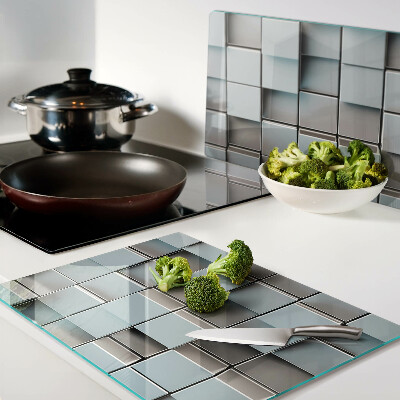 Tagliere in vetro temperato con motivo a piastrelle geometriche nei toni del blu