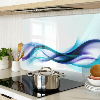 Tagliere in vetro temperato con decorazione a onde nei toni del blu e turchese