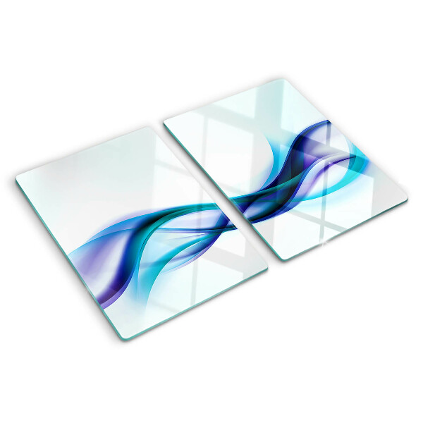 Tagliere in vetro temperato con decorazione a onde nei toni del blu e turchese