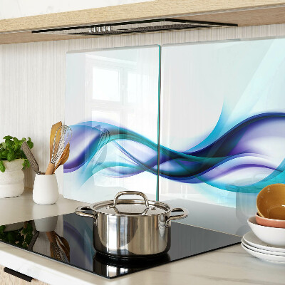 Tagliere in vetro temperato con decorazione a onde nei toni del blu e turchese