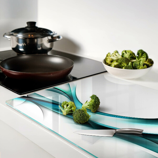 Tagliere in vetro temperato con motivo a onde nei toni del blu