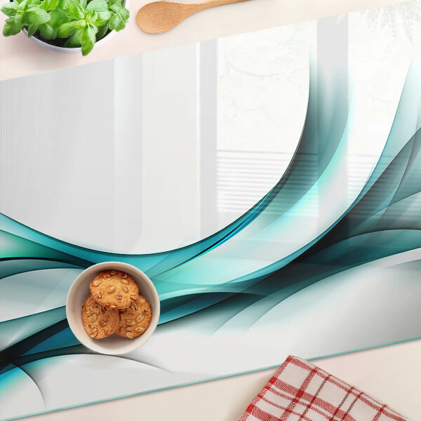 Tagliere in vetro temperato con motivo a onde nei toni del blu