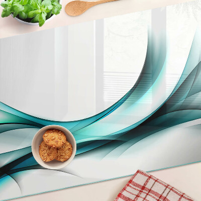 Tagliere in vetro temperato con motivo a onde nei toni del blu