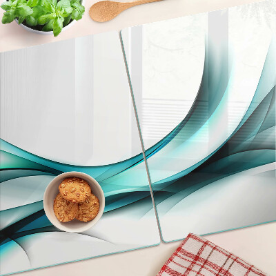 Tagliere in vetro temperato con motivo a onde nei toni del blu