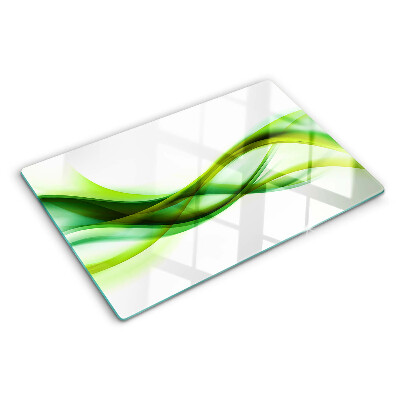 Tagliere in vetro con motivo a onde nei toni del verde