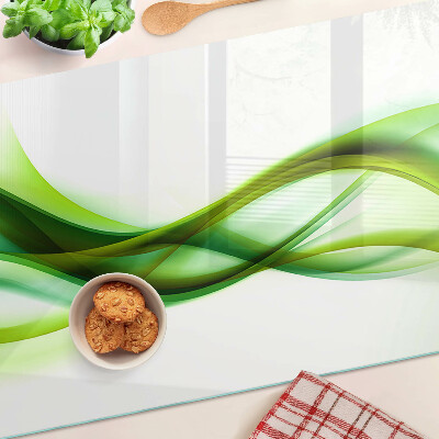 Tagliere in vetro con motivo a onde nei toni del verde