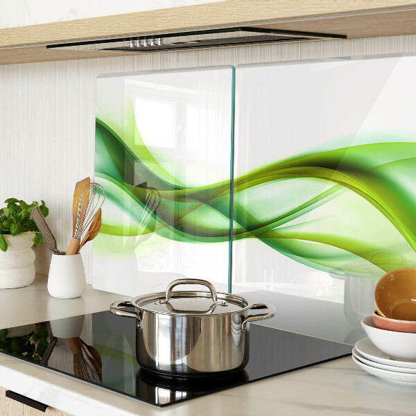 Tagliere in vetro con motivo a onde nei toni del verde