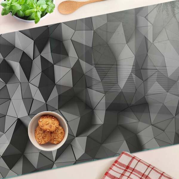 Tagliere in vetro con motivo geometrico astratto nei toni del grigio