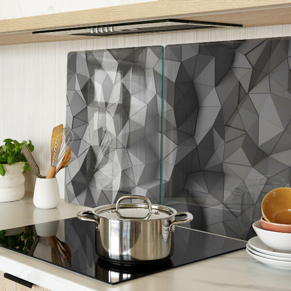 Tagliere in vetro con motivo geometrico astratto nei toni del grigio