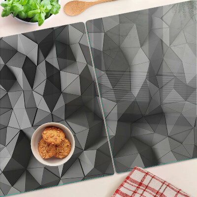 Tagliere in vetro con motivo geometrico astratto nei toni del grigio