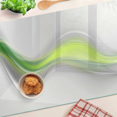 Tagliere in vetro temperato con motivo a onde nei toni del verde