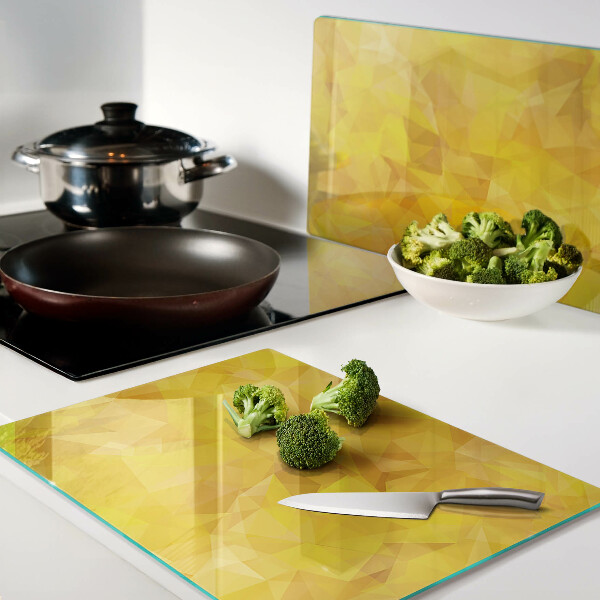 Tagliere in vetro con motivo a mosaico geometrico in tonalità gialle