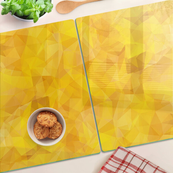 Tagliere in vetro con motivo a mosaico geometrico in tonalità gialle