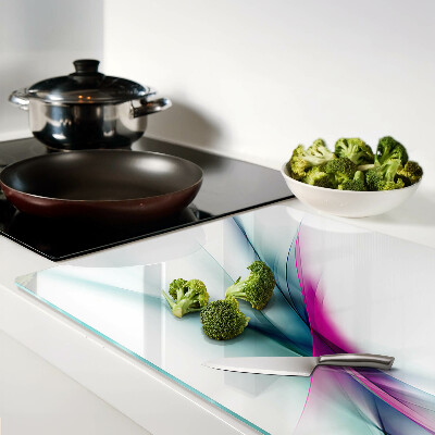 Tagliere in vetro con motivo di onde dai colori astratti