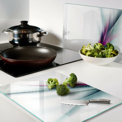 Tagliere in vetro con motivo di onde dai colori astratti