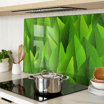 Tagliere in vetro temperato con motivo di foglie nei toni del verde