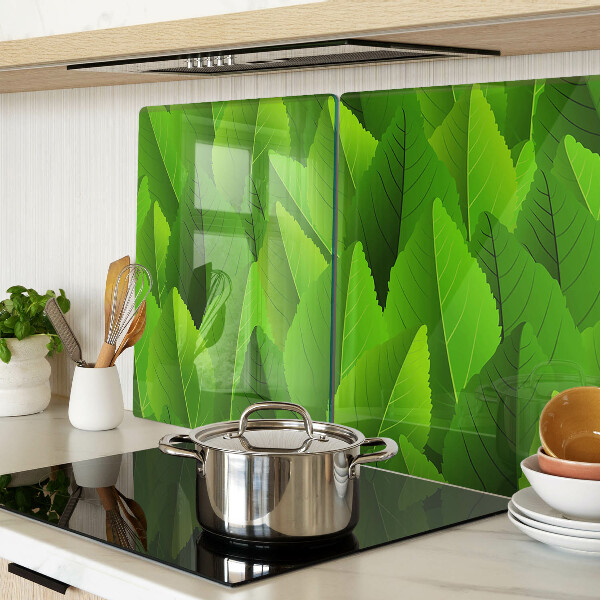 Tagliere in vetro temperato con motivo di foglie nei toni del verde