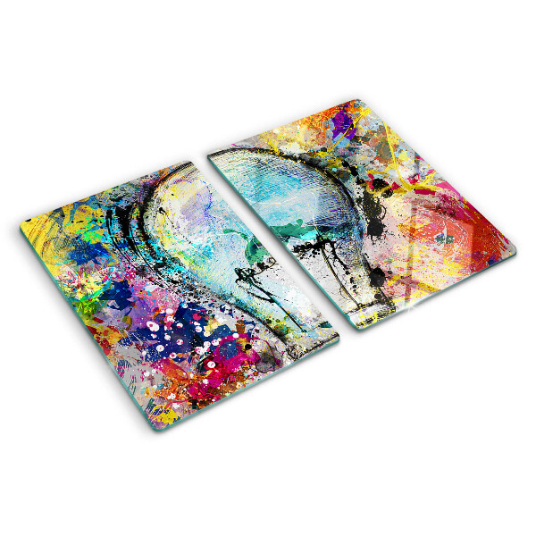 Tagliere in vetro temperato con stampa di una lampadina su sfondo colorato