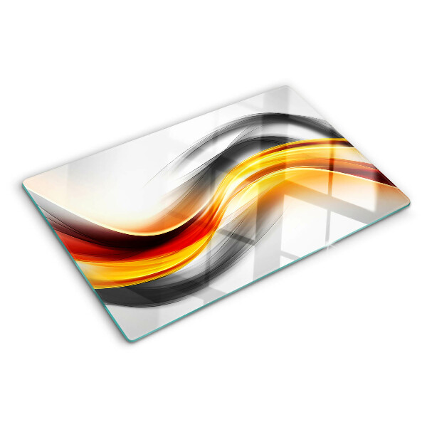Tagliere in vetro temperato Onde nei colori arancione e nero