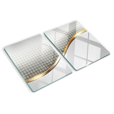 Tagliere in vetro temperato con motivo a onda dorata su sfondo a pois