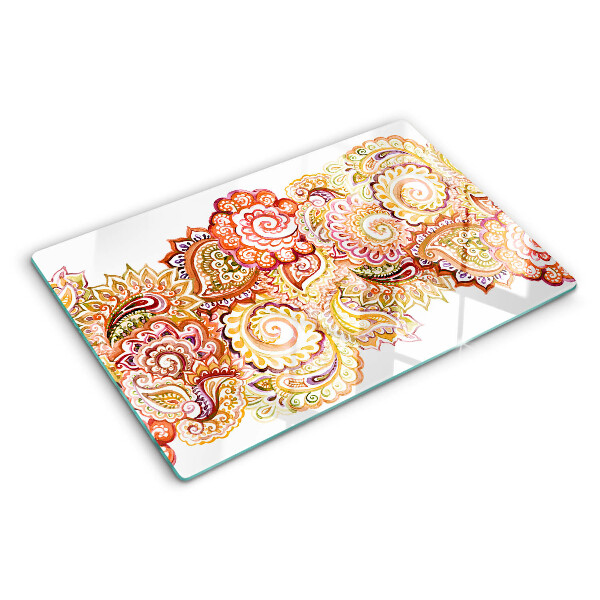 Tagliere in vetro con motivo paisley nei toni del rosso e dell'oro