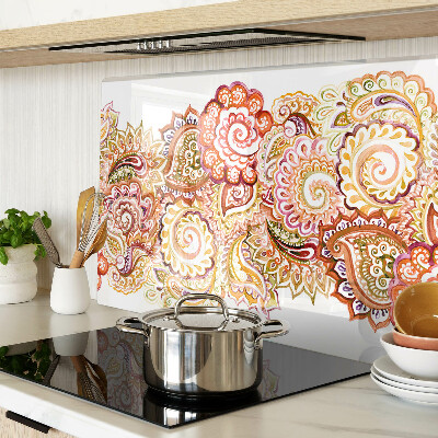 Tagliere in vetro con motivo paisley nei toni del rosso e dell'oro