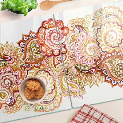 Tagliere in vetro con motivo paisley nei toni del rosso e dell'oro