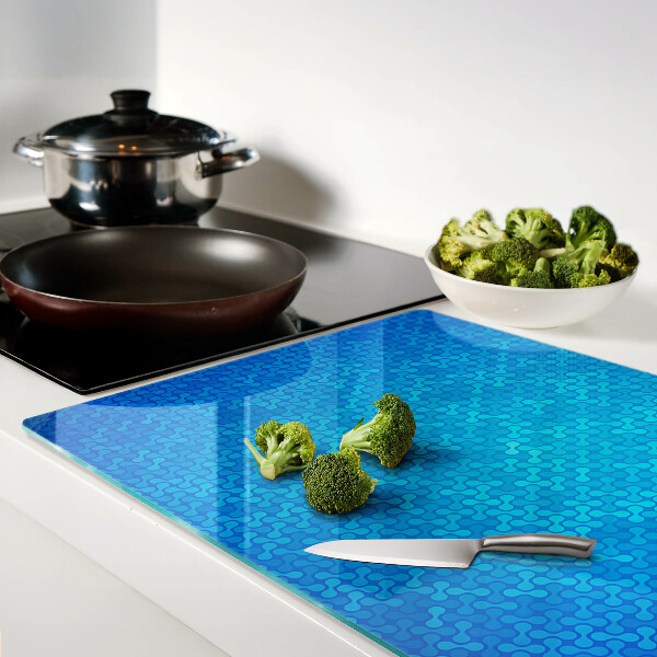 Tagliere in vetro temperato con motivo ondulato nei toni del blu