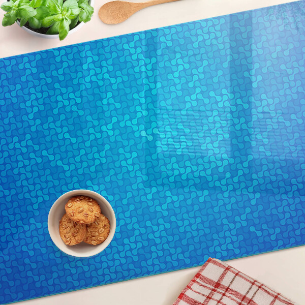 Tagliere in vetro temperato con motivo ondulato nei toni del blu