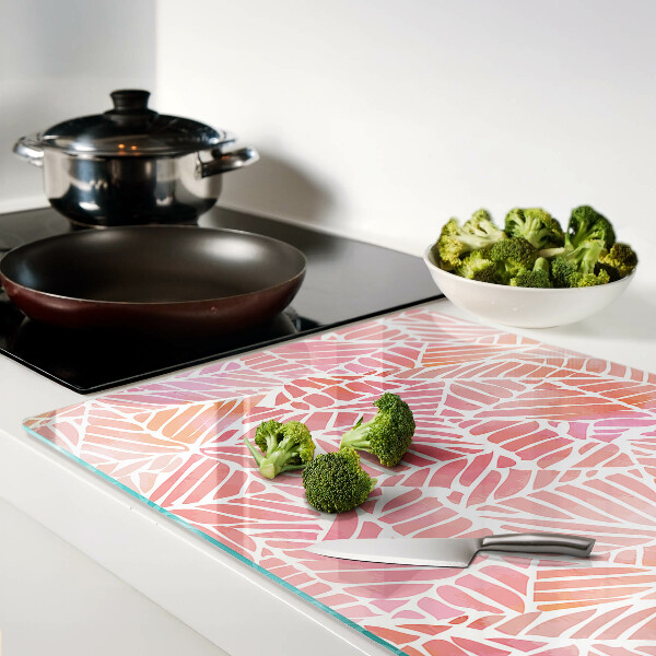 Tagliere in vetro con decorazione a foglie in tonalità pastello