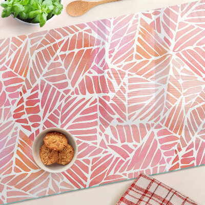 Tagliere in vetro con decorazione a foglie in tonalità pastello