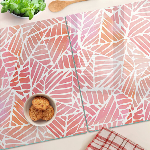 Tagliere in vetro con decorazione a foglie in tonalità pastello