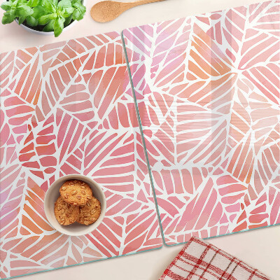 Tagliere in vetro con decorazione a foglie in tonalità pastello