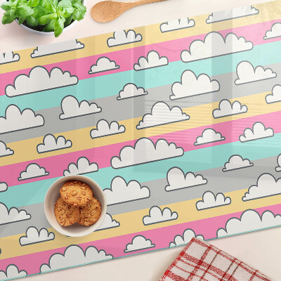 Tagliere in vetro temperato con motivo di nuvole su sfondo pastello